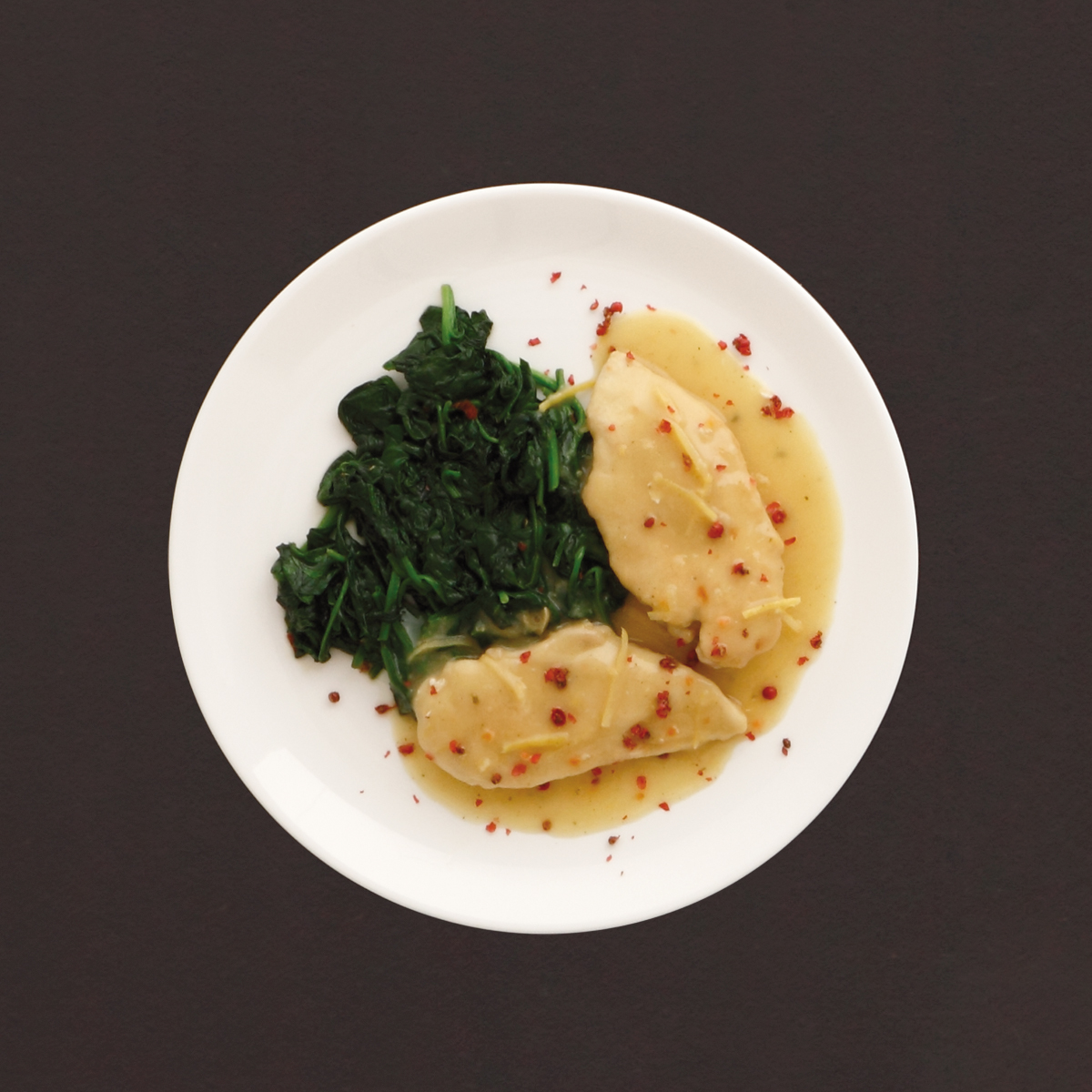 Huhnchenbrustfilet mit Rosa Pfeffer Hühnchenbrustfilet mit Rosa Pfeffer, Spinat und Zitronen-Sauce