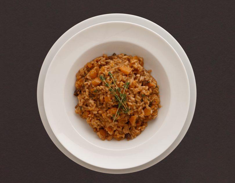 Kürbisrisotto mit getrockneten Steinpilzen und Thymian
