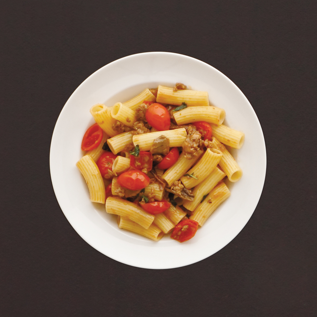 Rigatoni alla Boscaiola Rigatoni alla Boscaiola mit Salsiccia und Steinpilzen