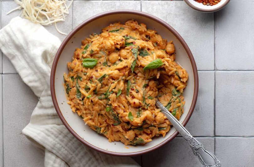 Creamy Tomato Orzo with Peas and Spinach